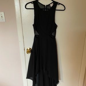 LBD with cutouts and a train like back